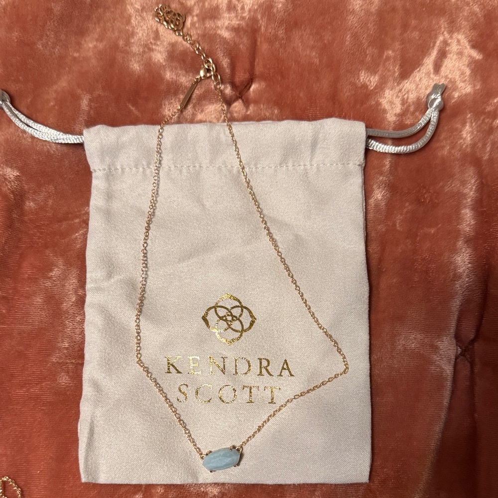 Kendra Scott Gold Necklace with Light Blue Stone